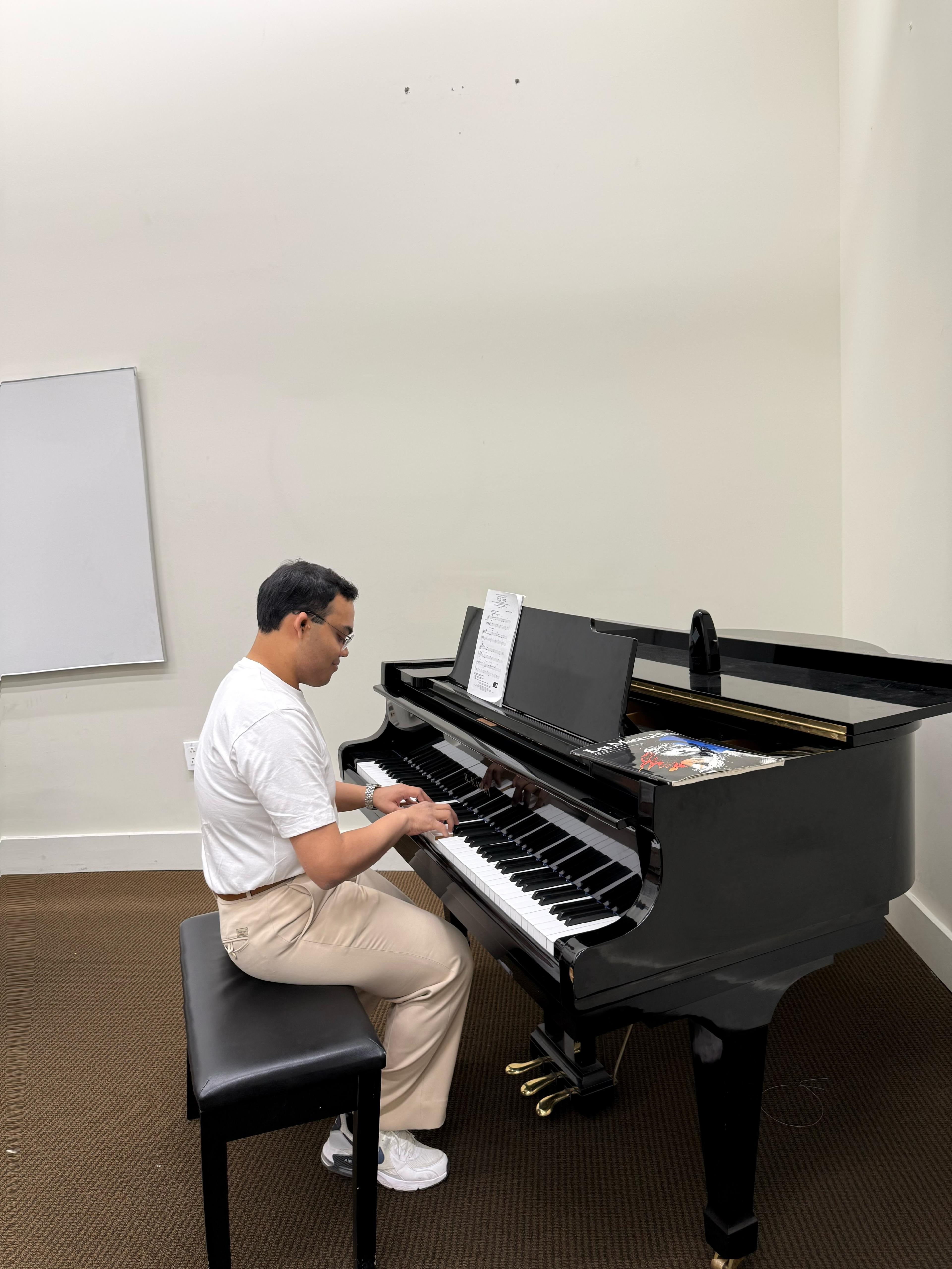 Adrian playing piano